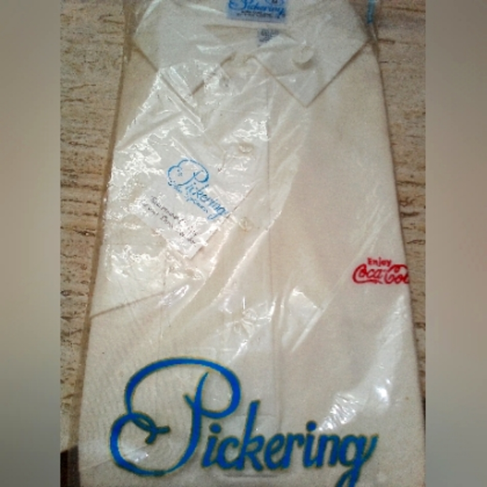 A  man's White shirt that is brand new.  You can wear it casual or dress it up